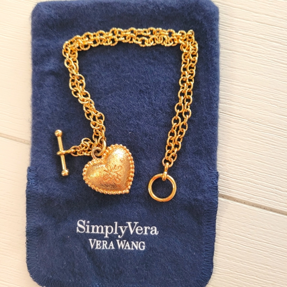 18kt gold chain bracelet with heart charm